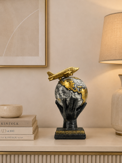 World Globe with Airplane Statue